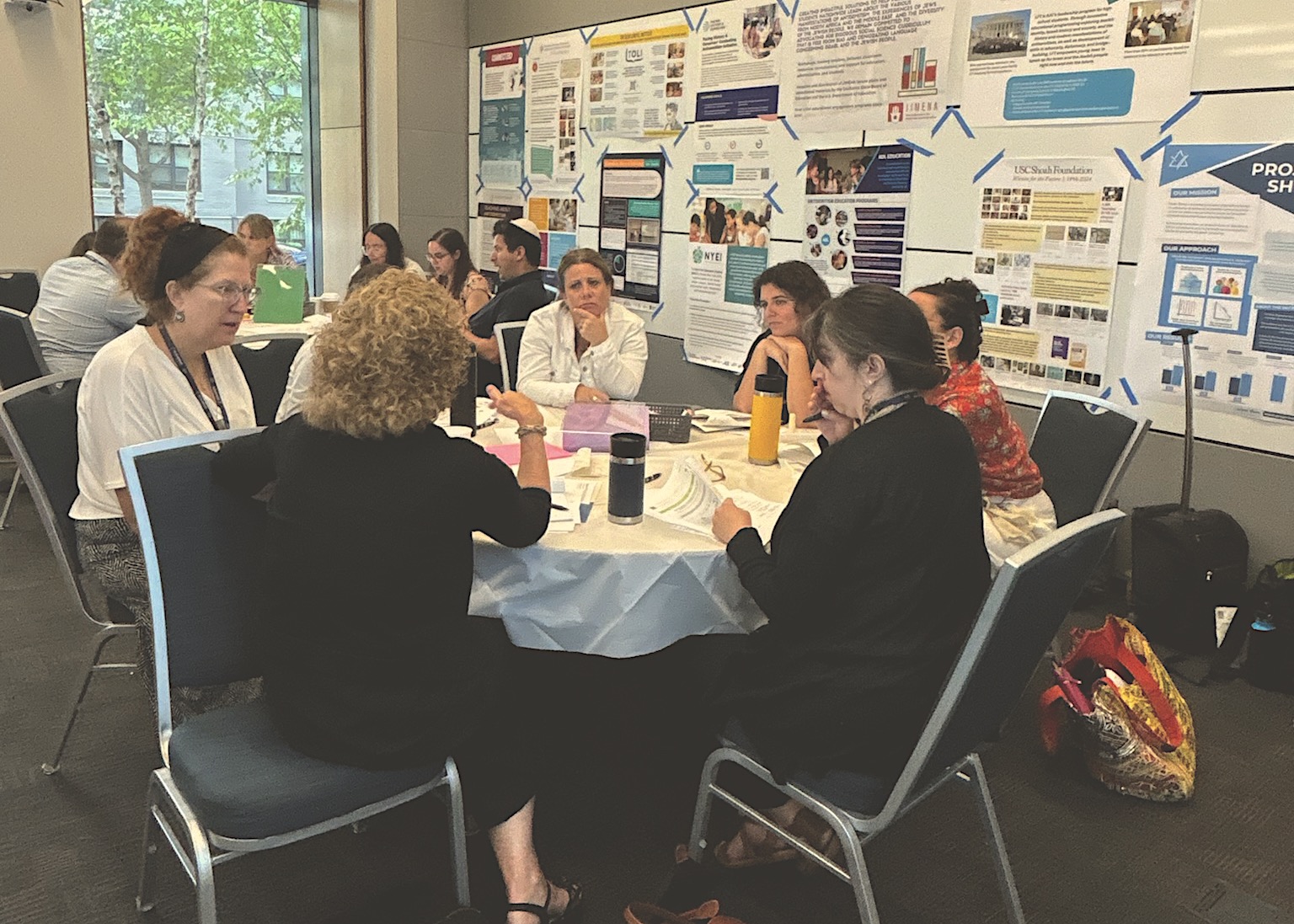 Table of people at the TPT convening