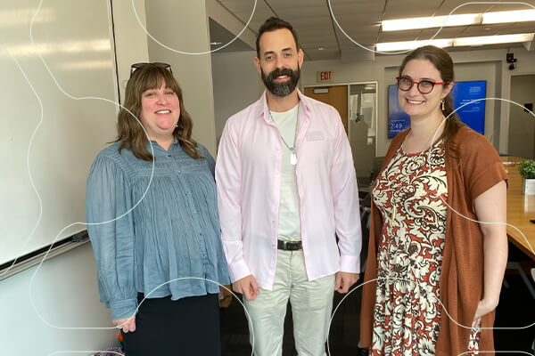 Three CASJE Applied Research Fellows stand together to pose for photo
