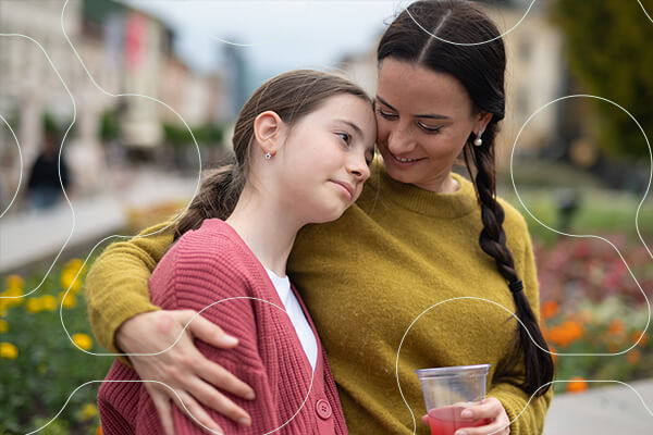 Mother and daughter embracing