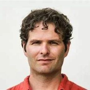 Man with orange shirt