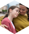 Mother and daughter embracing