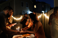 Lighting candles in the dark